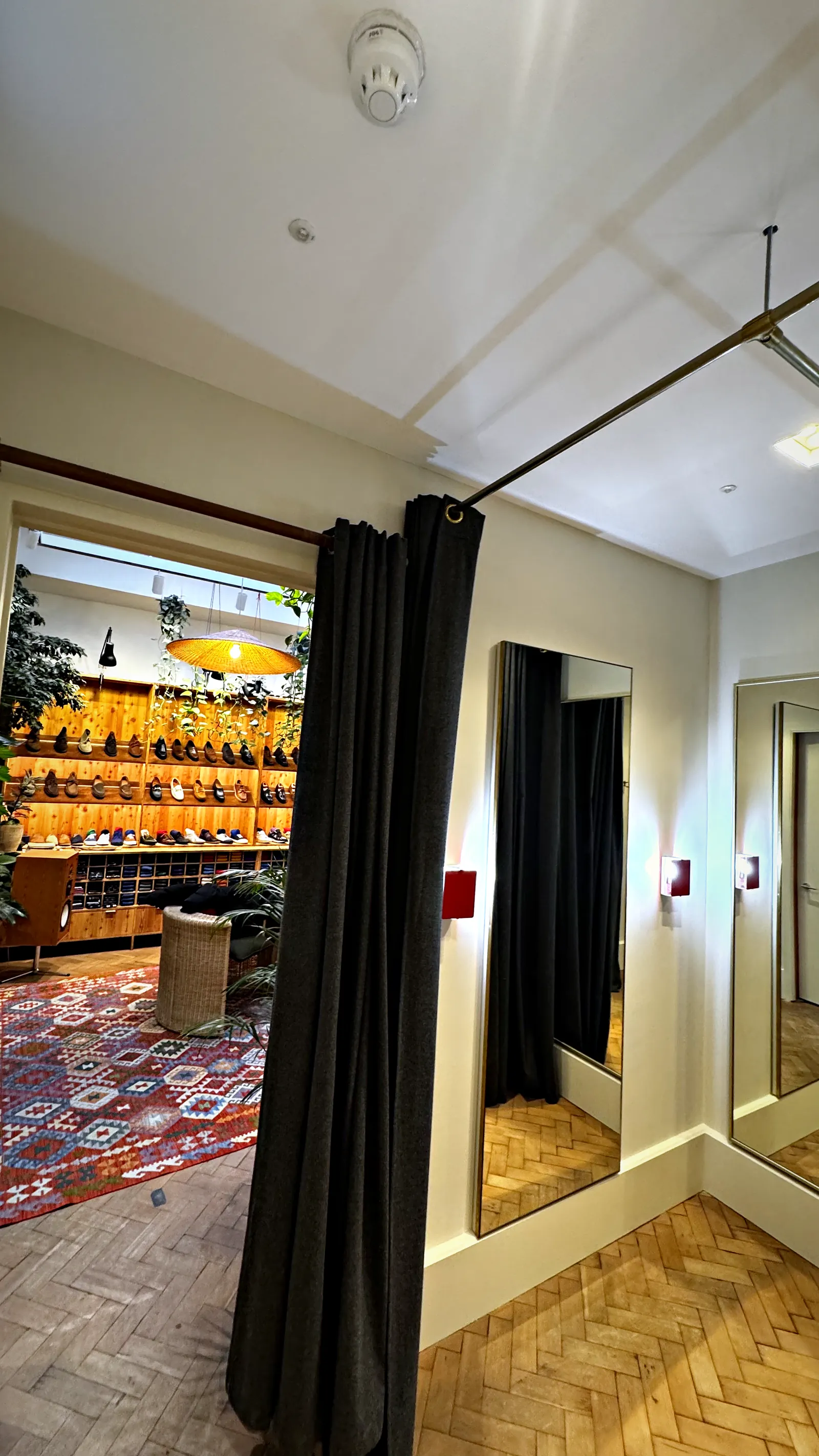 A finished fitting room, opening onto the Drake's shop floor.